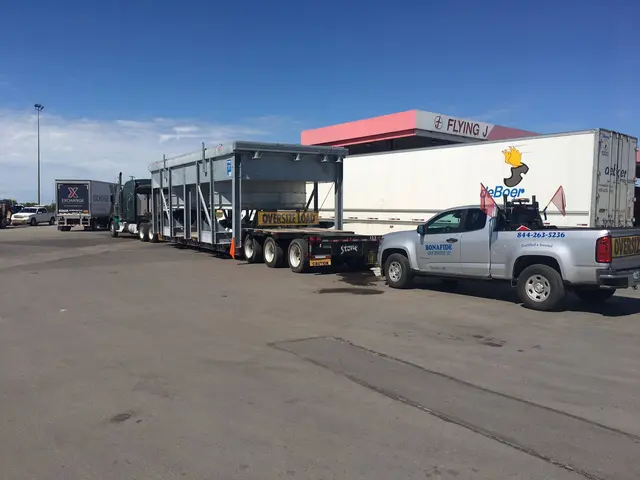 Bonafide pilot truck beside a modular load