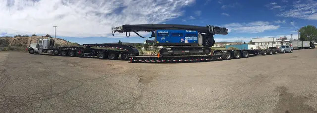 Long drilling rig load on a trailer